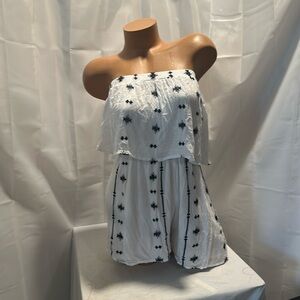 Woman’s white blue trim, romper new with tags size large very fashionable